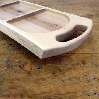 Empty triple-compartment birch tray with smooth finish and rustic appeal