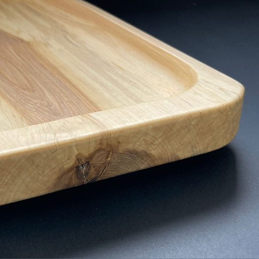 Spalted birch grain pattern on artisanal charcuterie board