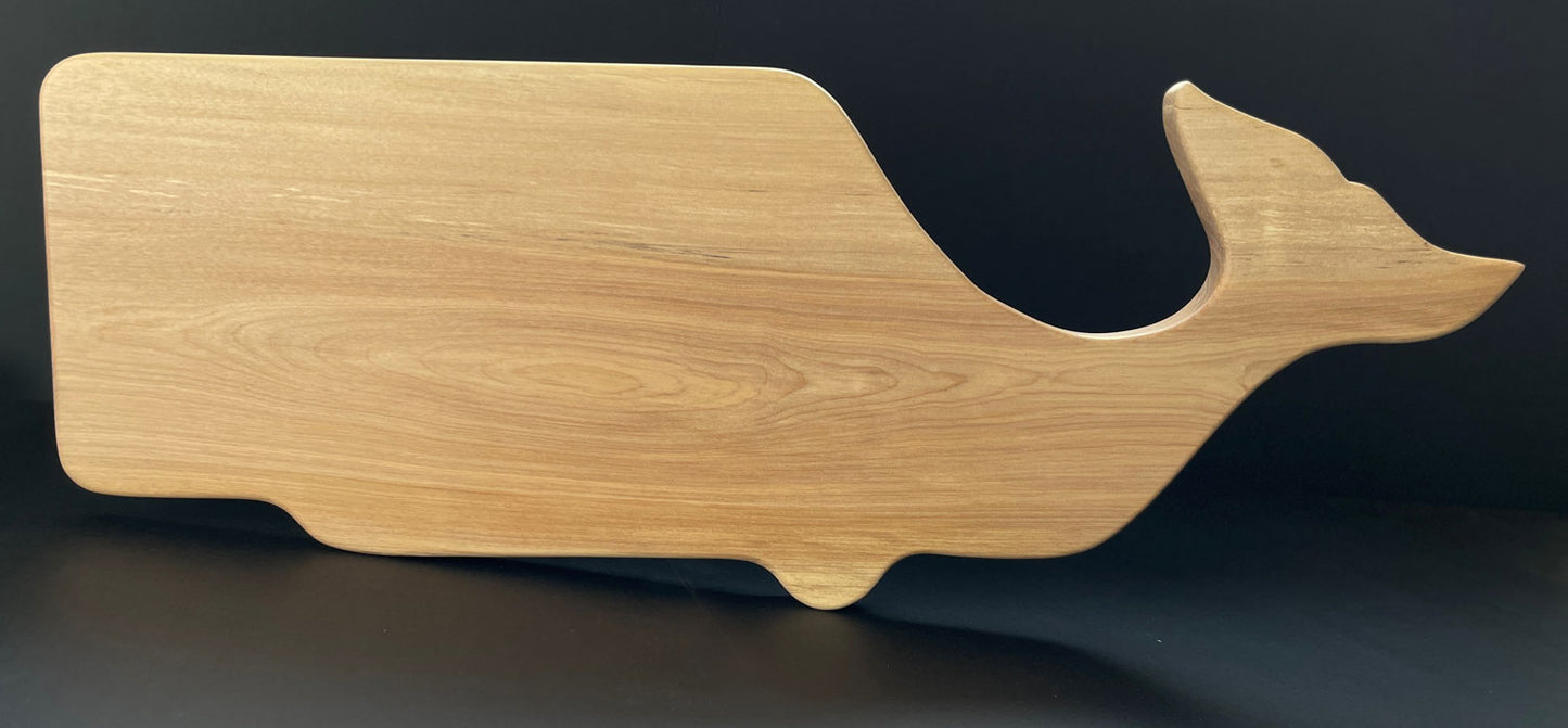 Whale-shaped charcuterie board handcrafted from birch wood