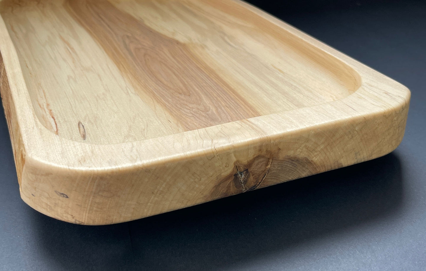 Spalted birch grain pattern on artisanal charcuterie board