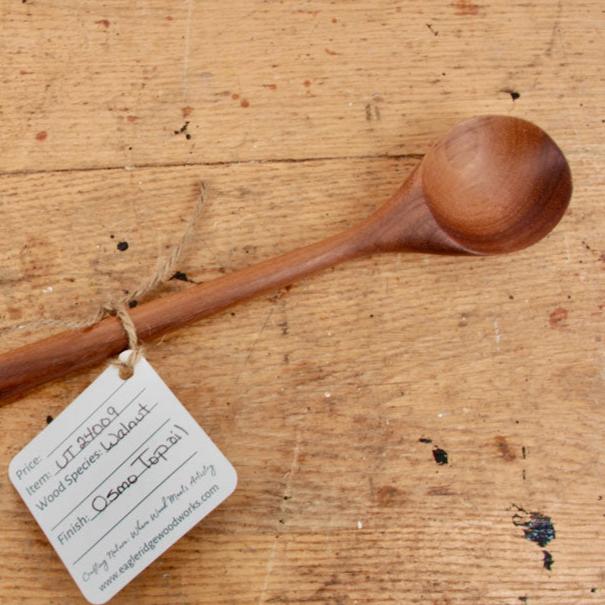 Curved black walnut spoon bowl showing natural wood grain