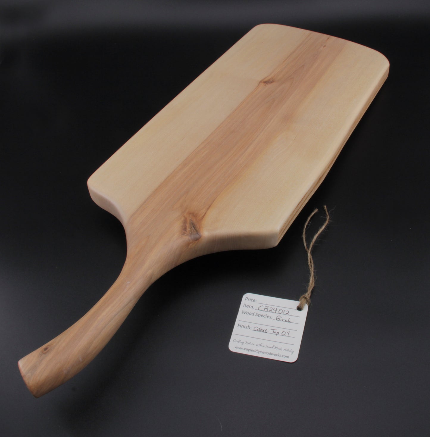 Birch charcuterie board showing smooth finish and organic edge grain
