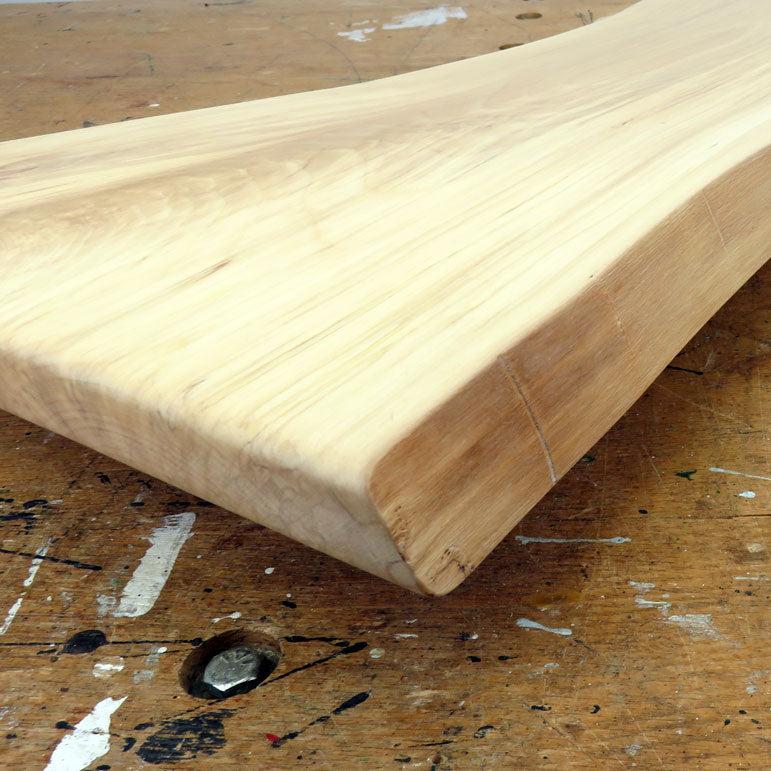 Organic live edge of birch wood with natural grain and shape