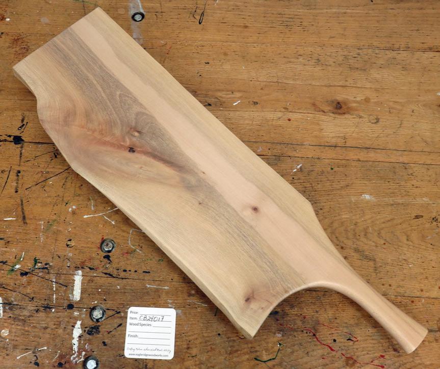 Maple wood serving board with smooth finish and pan handle design