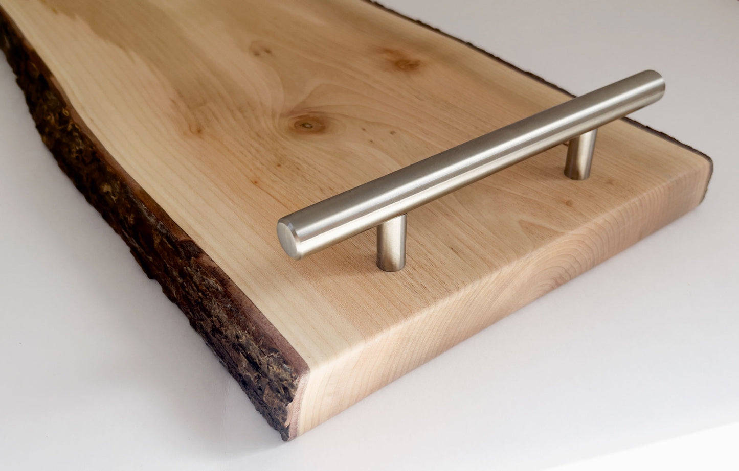 Close-up of live edge maple grain with smooth finish