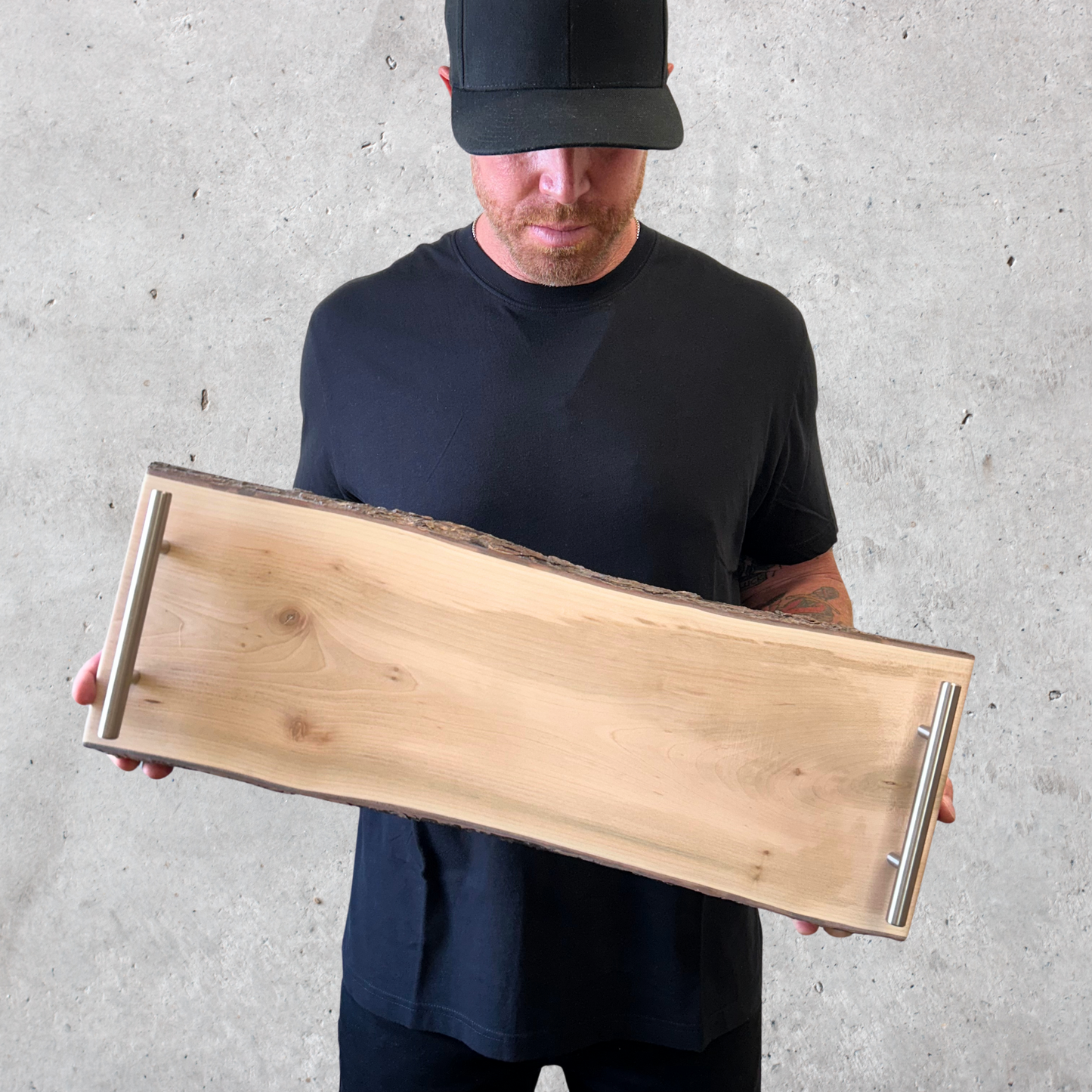 Maple serving tray with live edge and silver metal handles