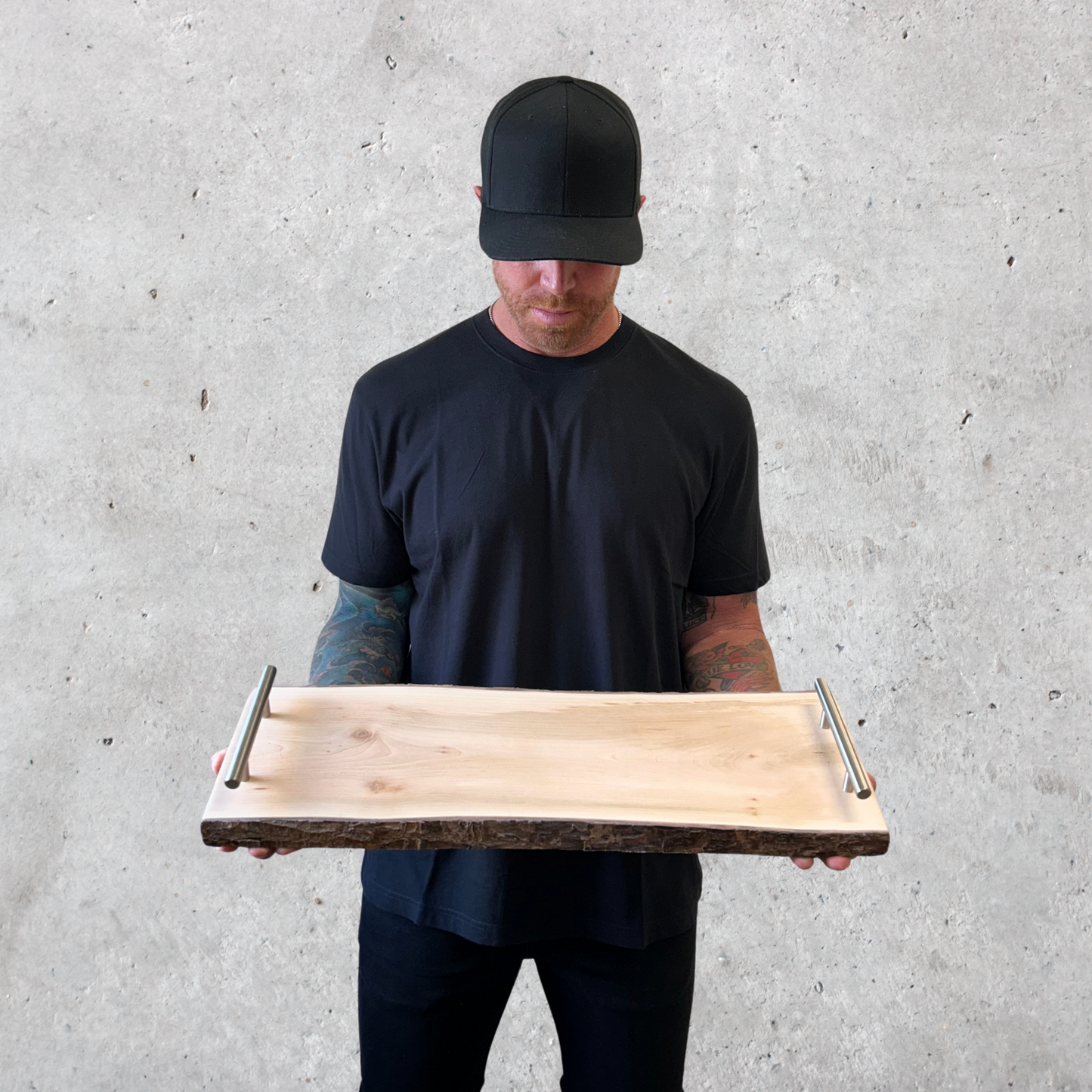 Handcrafted maple tray with natural edge and modern silver handles