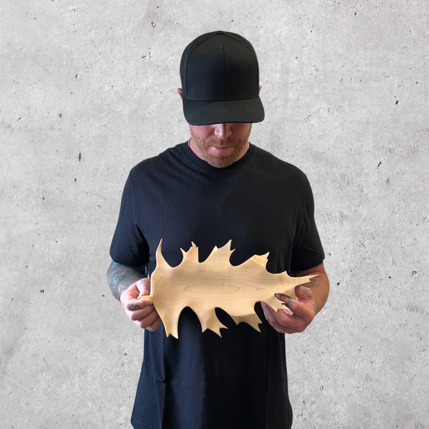 Handcrafted oak leaf dish made from solid wood with natural finish