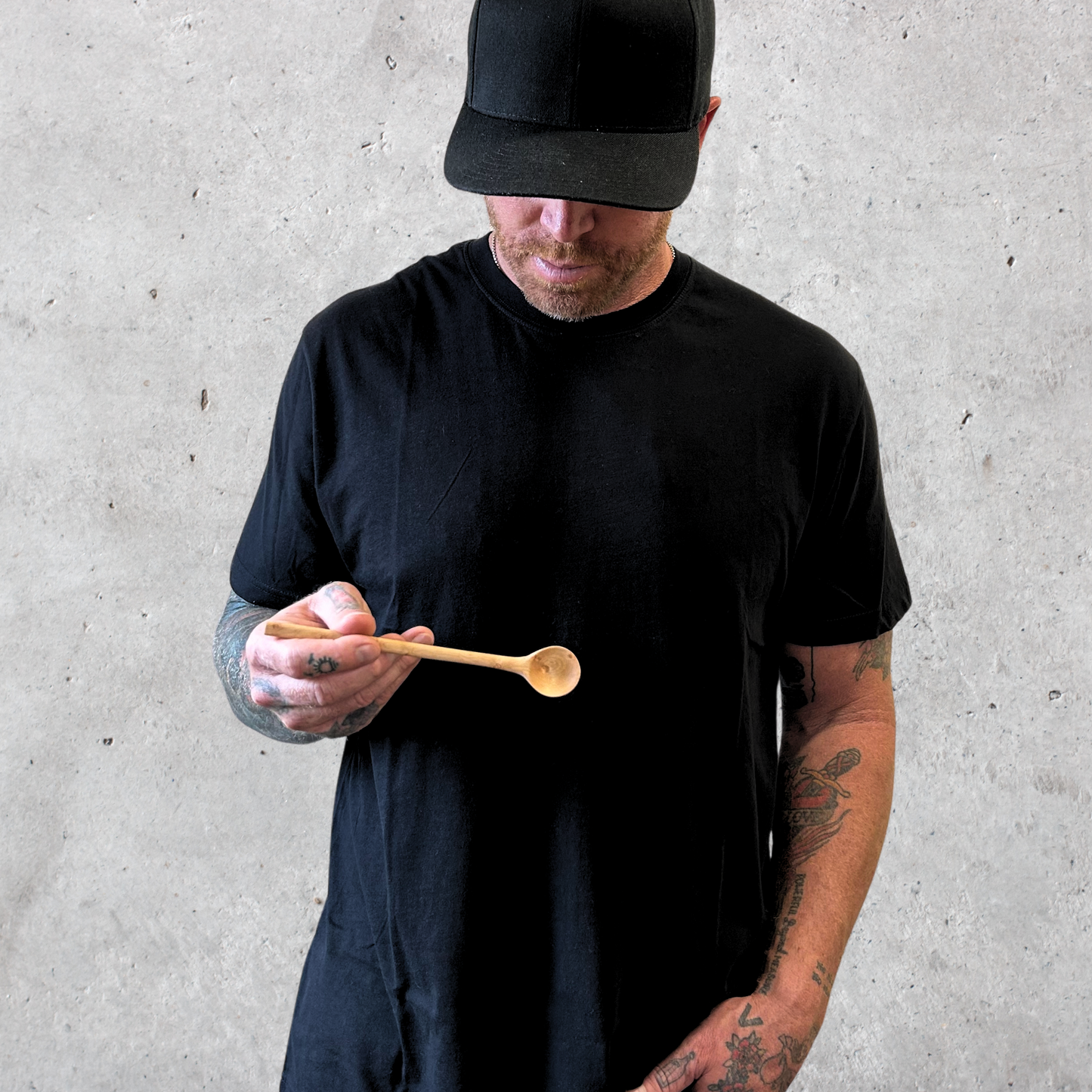 Bird’s eye maple spoon with smooth grain and ergonomic handle