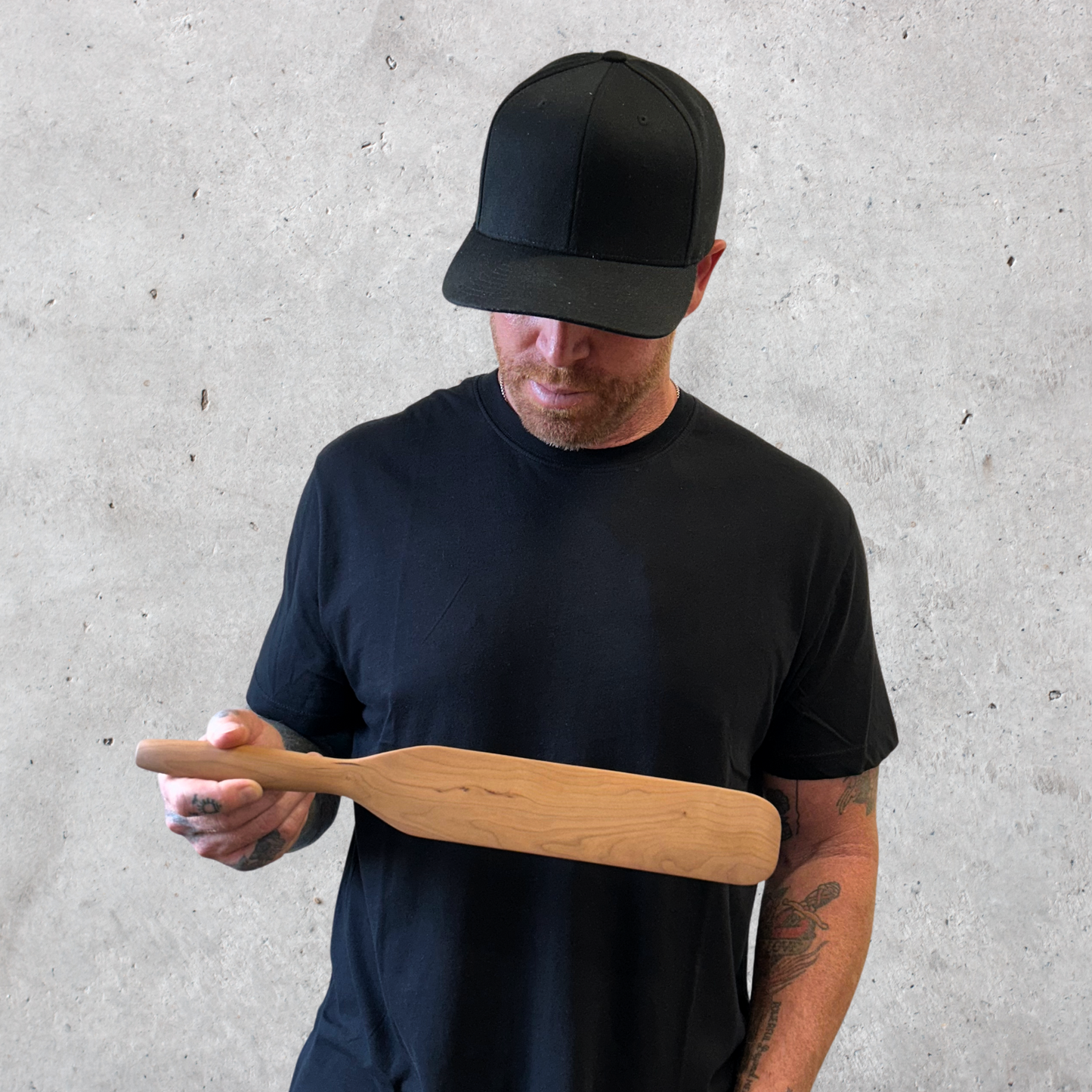 Handcrafted cherry wood spurtle with smooth tapered edges